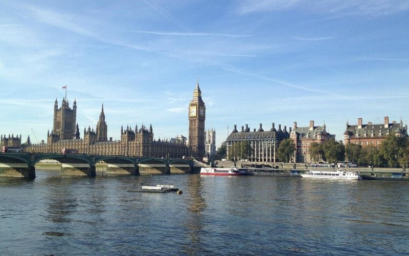 The River Thames with Westminster Bridge and the Houses of Parliament in London.