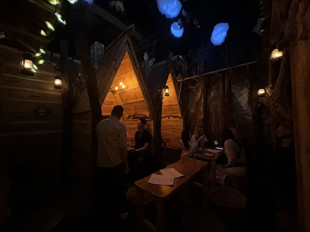The best things to do in Irvine at night including enjoying a drink at Cozy Pine speakeasy.