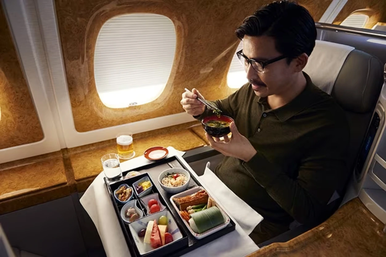 Multi-course dining in Emirates business class with regionally inspired meals