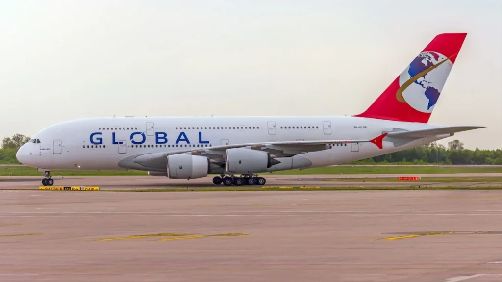 Global Airlines double-decker passenger airplane taxiing on the tarmac