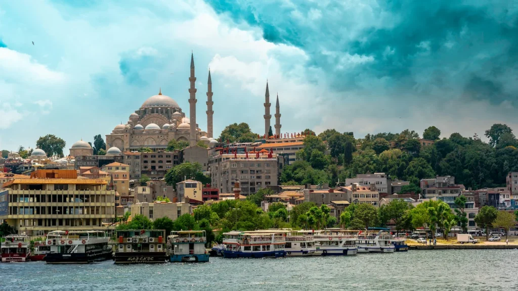 Süleymaniye Mosque standing on a hill overlooking boats docked on the Golden Horn in Istanbul