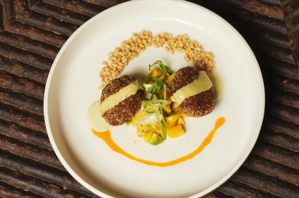 Jalapeno Queso Fresco Crab Cakes - lime-hatch chili aioli, tajin avocado - mango salad, pine nuts