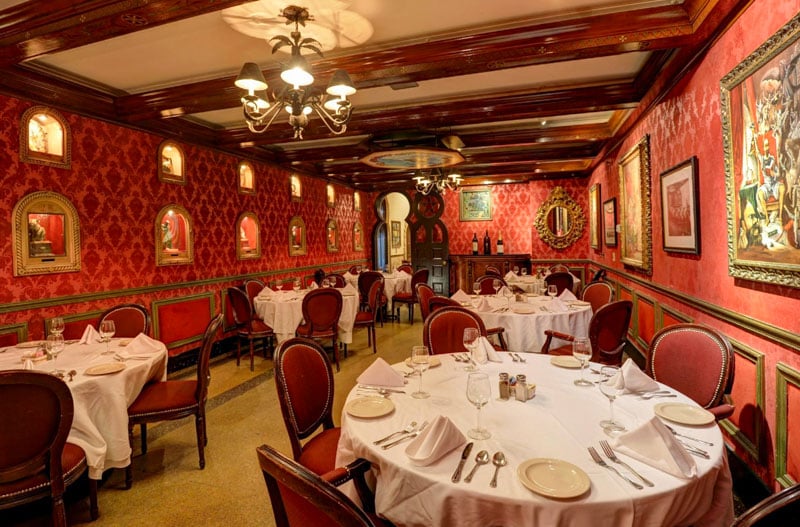 A historic Spanish restaurant with ornate decor and outdoor seating in Tampa, Florida.