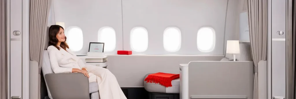 Passenger in Air France La Première first class cabin suite