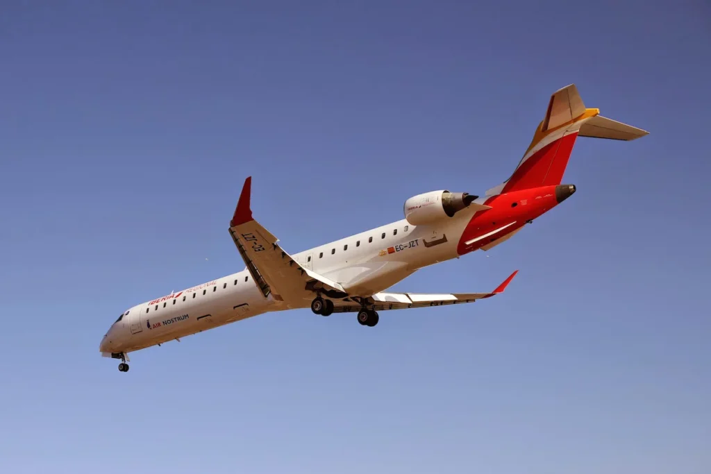Air Nostrum Iberia Regional Bombardier CRJ-1000 aircraft with registration EC-JZT flying on landing approach