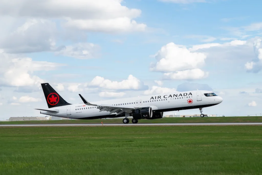 Air Canada Airbus A321XLR passenger plane taking off from a runway