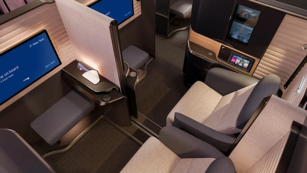 British Airways first-class cabin suite with gray seats