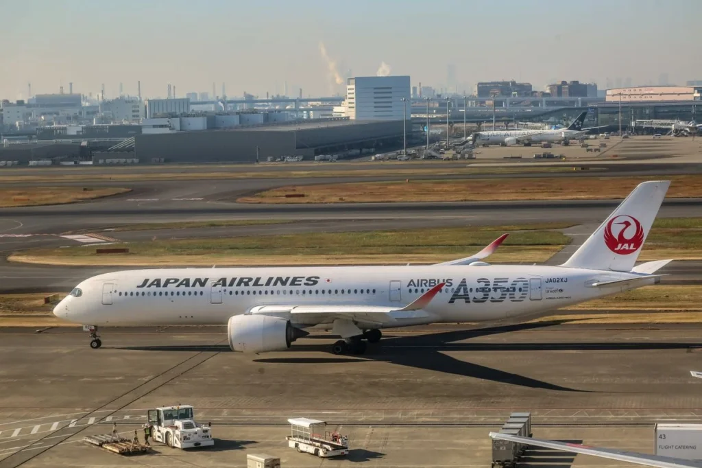Japan Airlines Airbus A350-900 taxiing on an airport tarmac