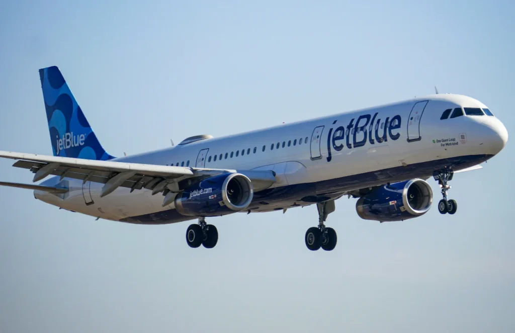 JetBlue Airways Airbus A321 passenger jet with landing gear down approaching for a landing