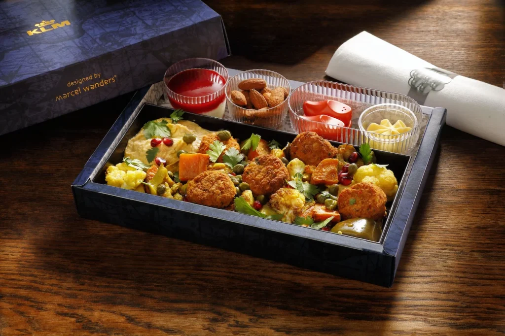 KLM inflight meal box with falafel, roasted vegetables, and almonds
