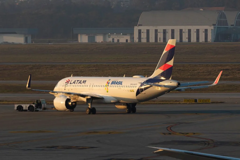 LATAM Airlines Brasil Airbus A320neo taxiing in a green and yellow livery