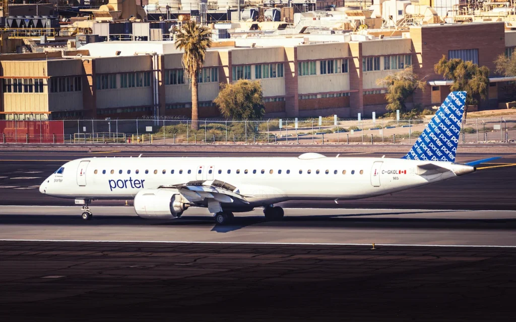 Porter Airlines Embraer E195-E2 airplane registration C-GKQL taxiing on the airport runway