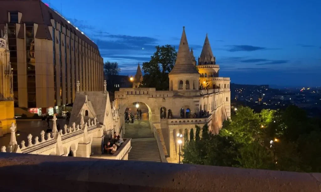 Fisherman’s Bastion lit up at night with its fairytale-like towers.