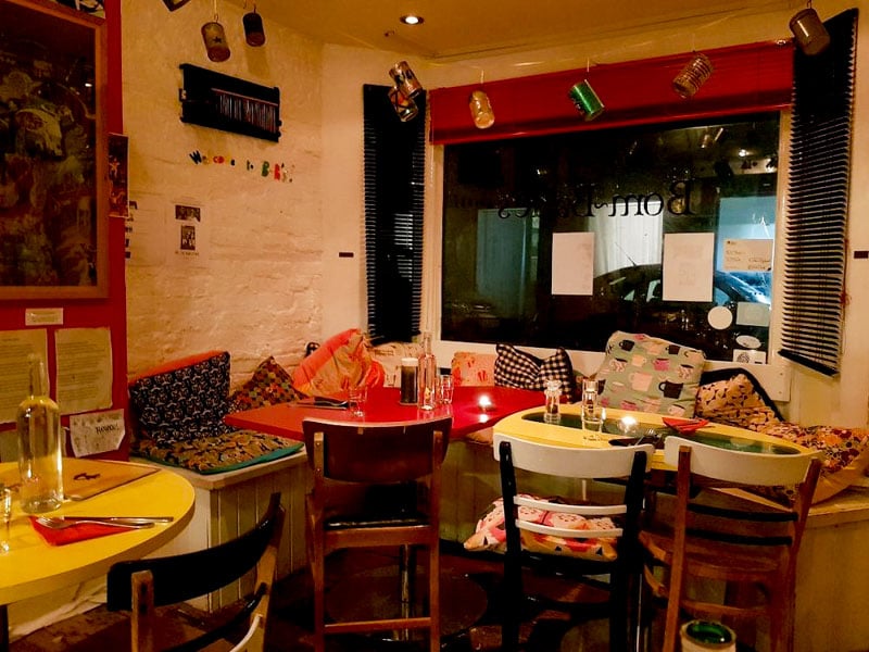 Bom-Bane's, run by Jane, offers a cozy, quirky dining experience, like visiting a friend's house.