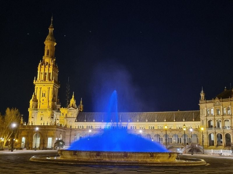 Plaza de España shines as one of Seville's must-visit attractions, especially enchanting after nightfall for those seeking evening fun.