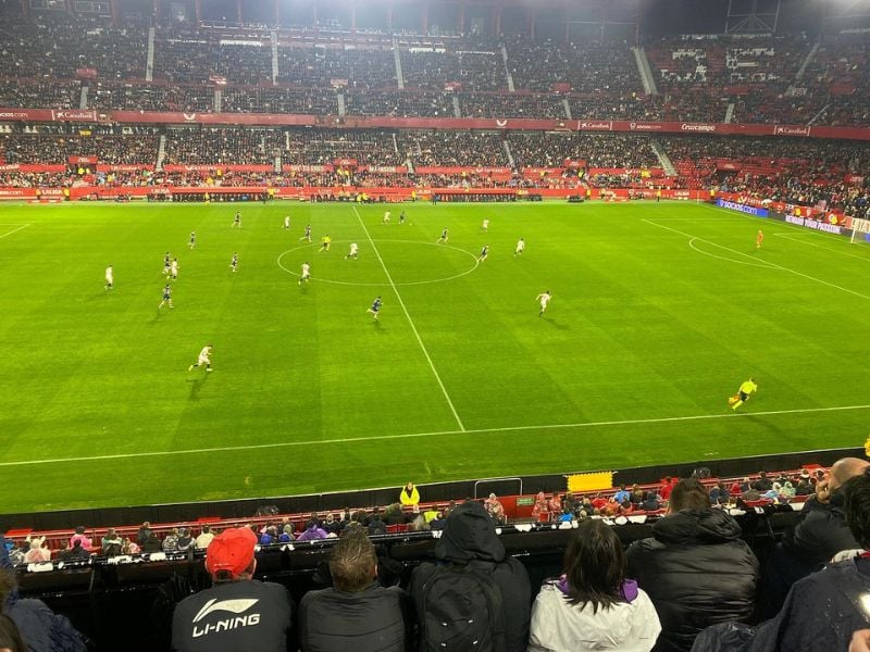 Experience the excitement of a live match at the Ramon Sanchez-Pizjuan Stadium, perfect for young adults in Seville.