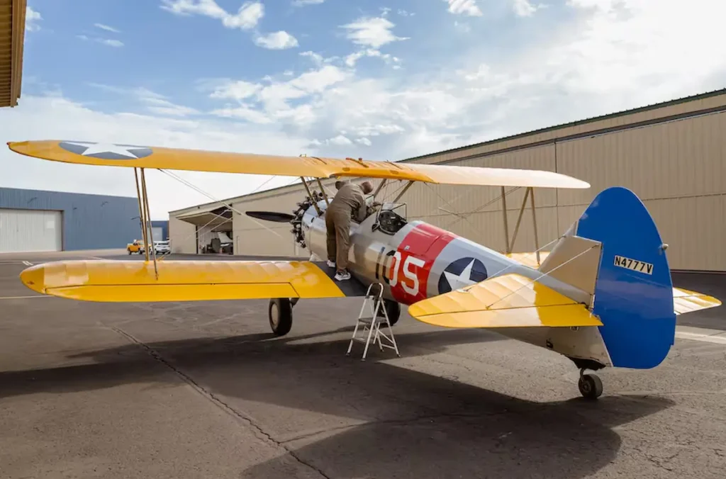 Flight lesson in an open cockpit biplane