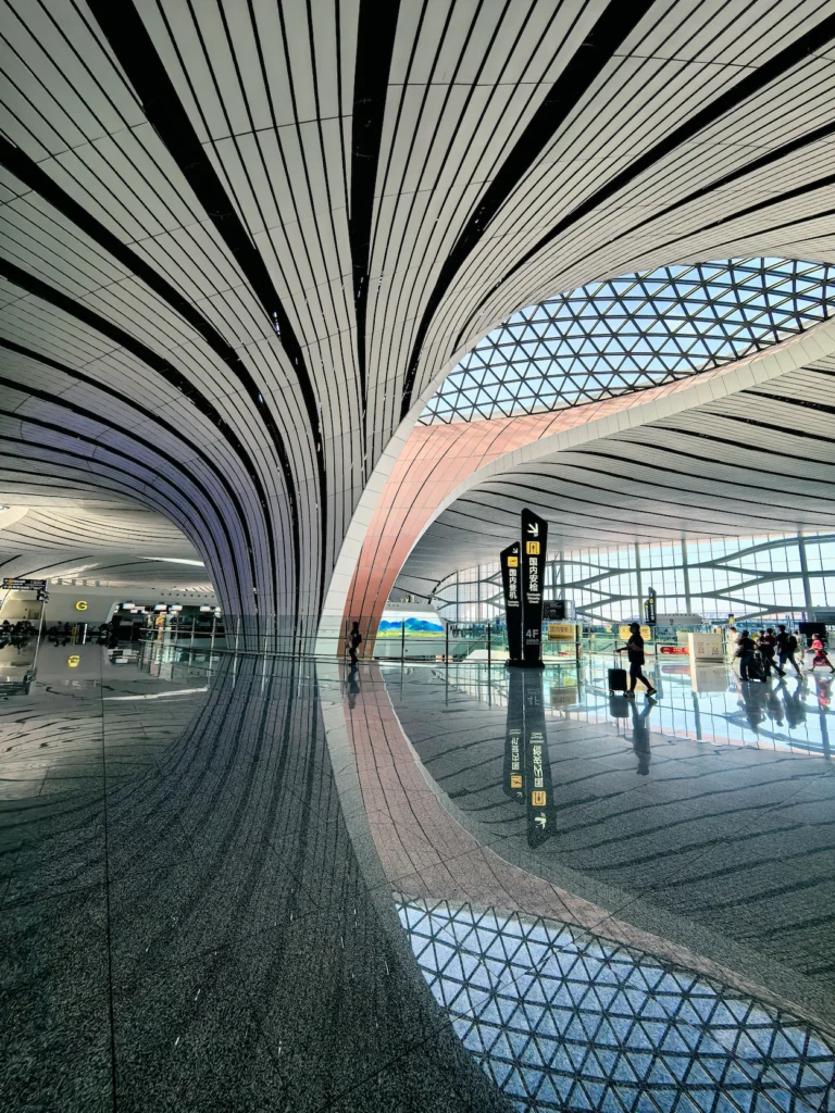 The sweeping, fluid columns and mesh skylights inside Beijing Daxing Airport