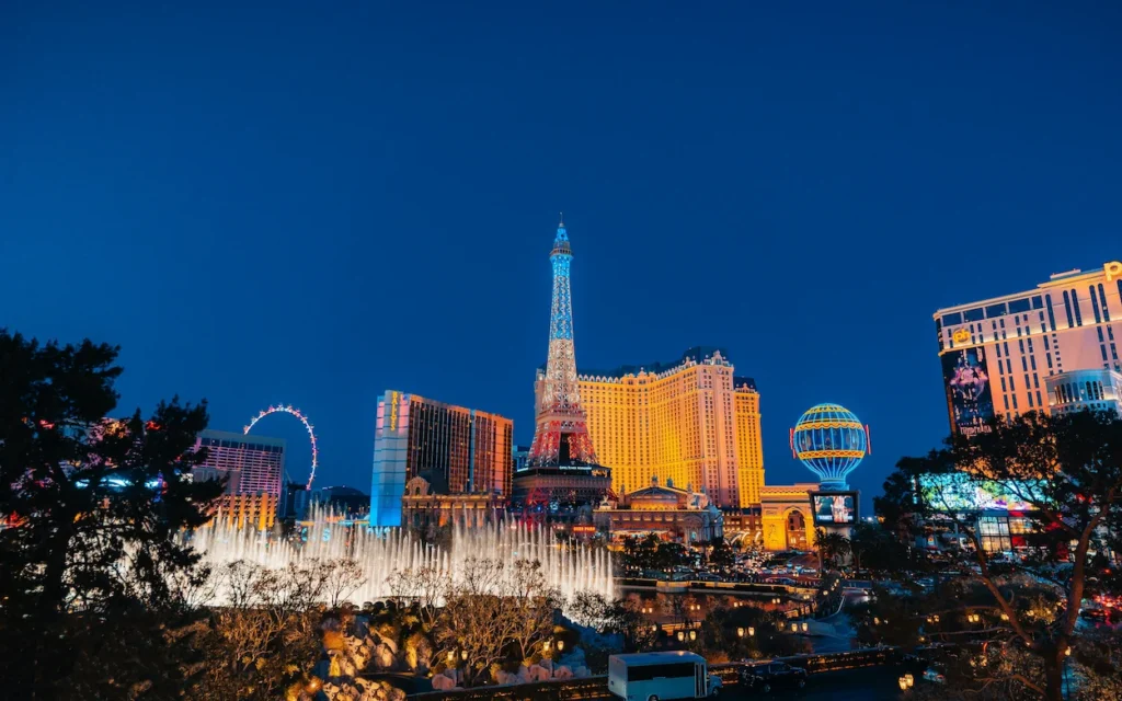 Bellagio fountains shooting water in front of the Paris Las Vegas Eiffel Tower replica