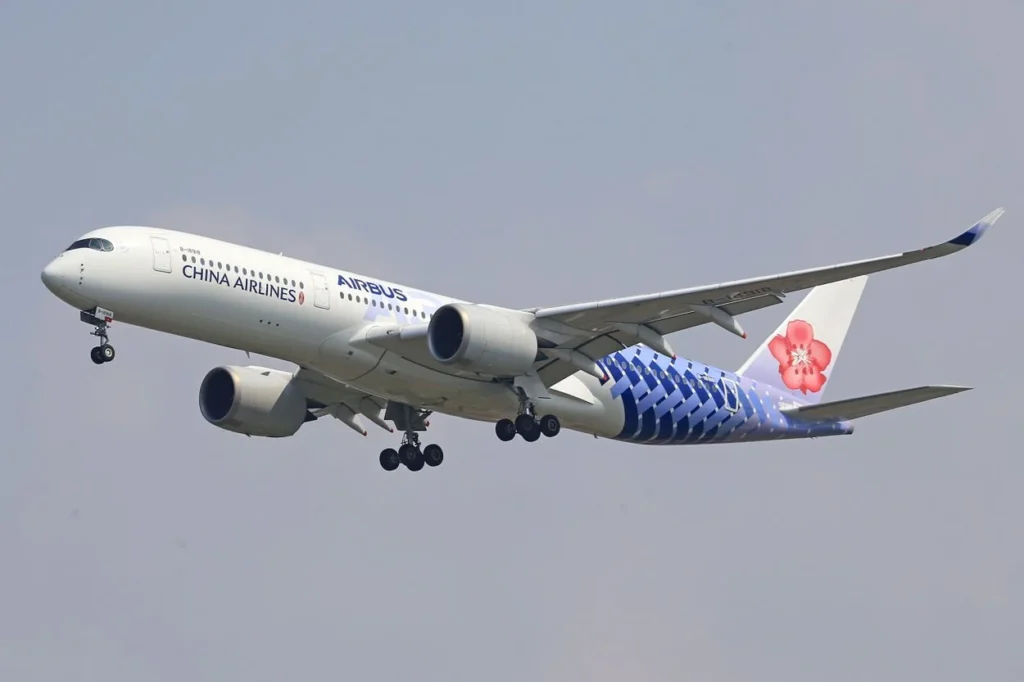 A China Airlines Airbus A350-900 passenger airplane in a special blue carbon weave livery