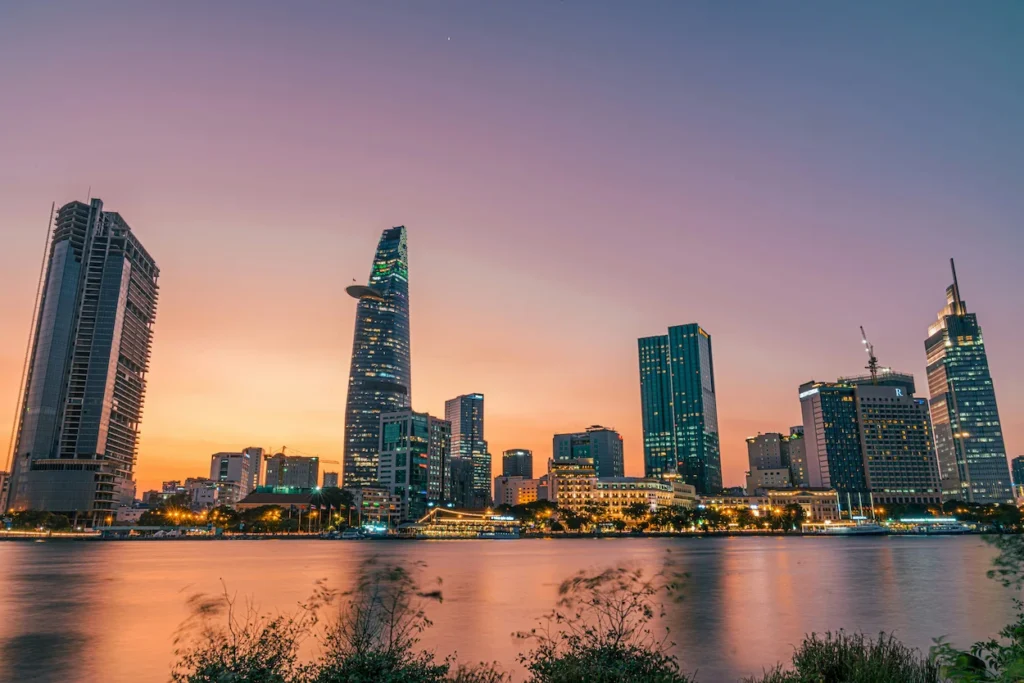 Ho Chi Minh City skyline at sunset across the Saigon River