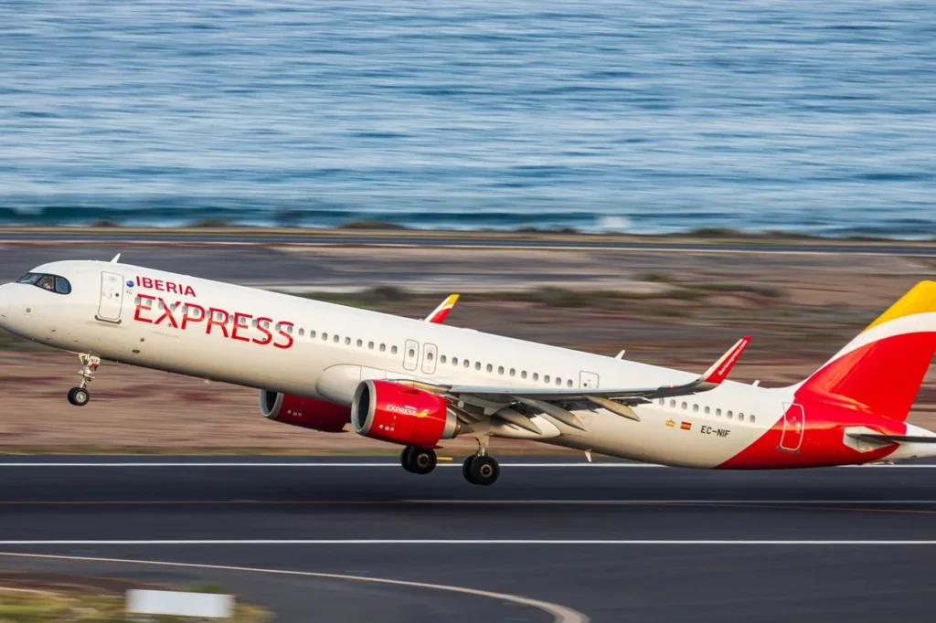 Iberia Express Airbus A321neo passenger airplane taking off from a runway