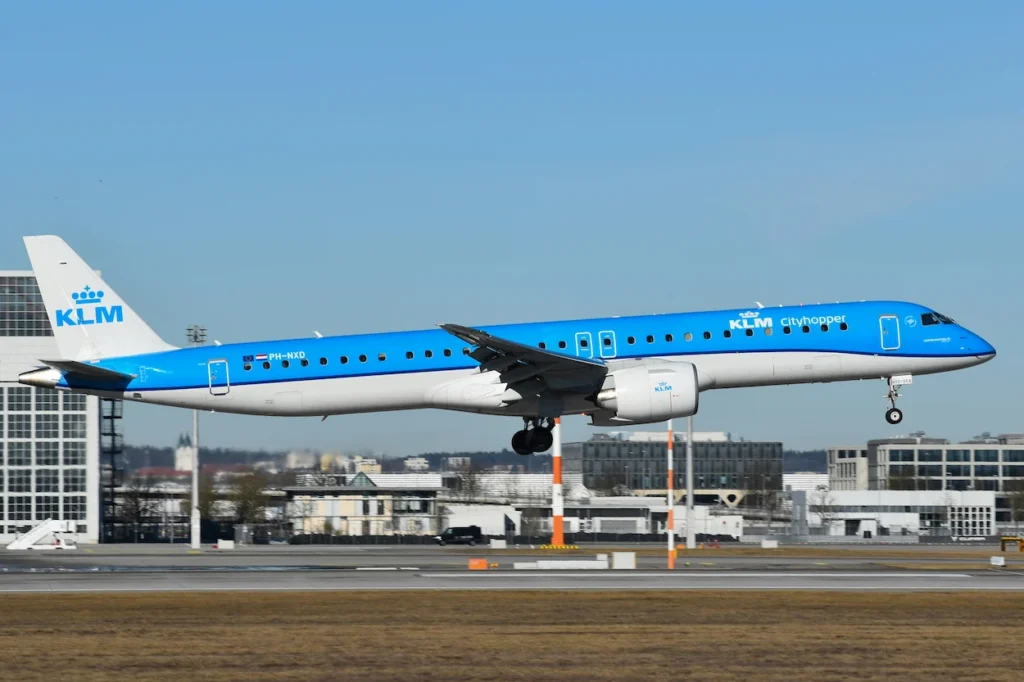 KLM Cityhopper Embraer 195-E2 regional jetliner landing at an airport