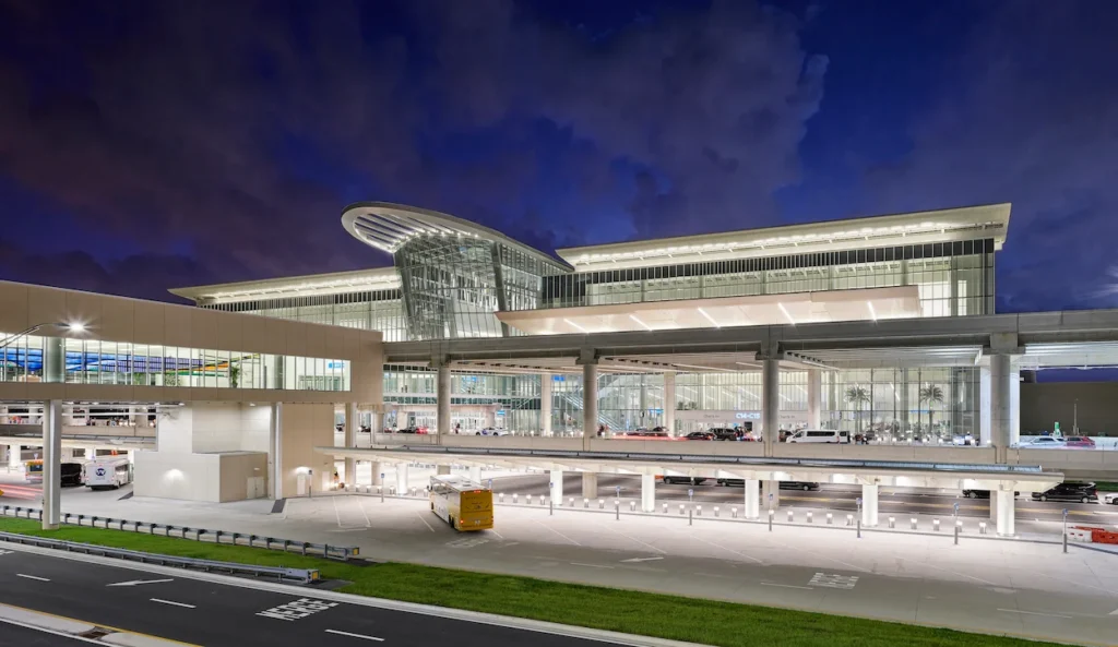 The multi-level modern glass exterior of MCO Airport Terminal C