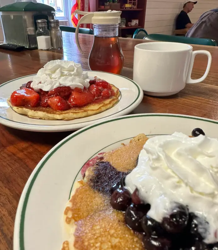 Sweet cream fruit topped pancakes