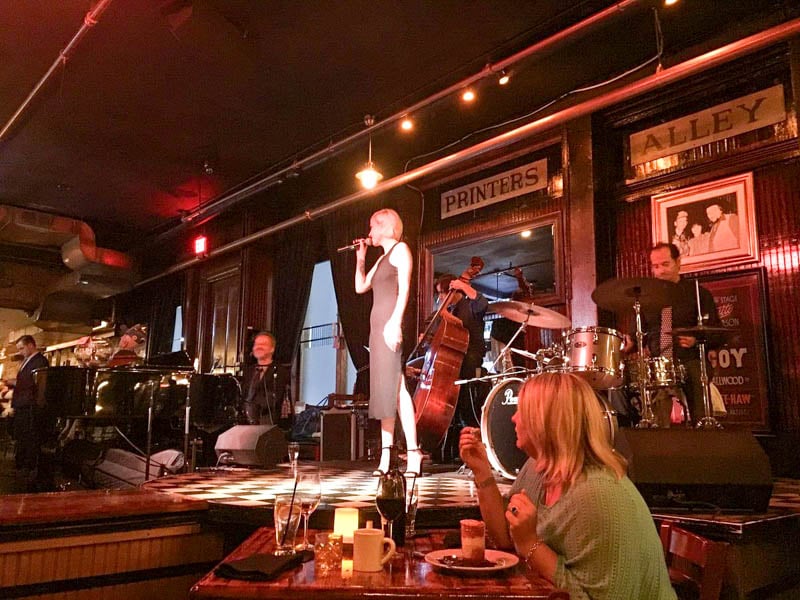 Step into history at Skull's Rainbow Room, a fun restaurant since 1948, offering delicious meals and entertainment.