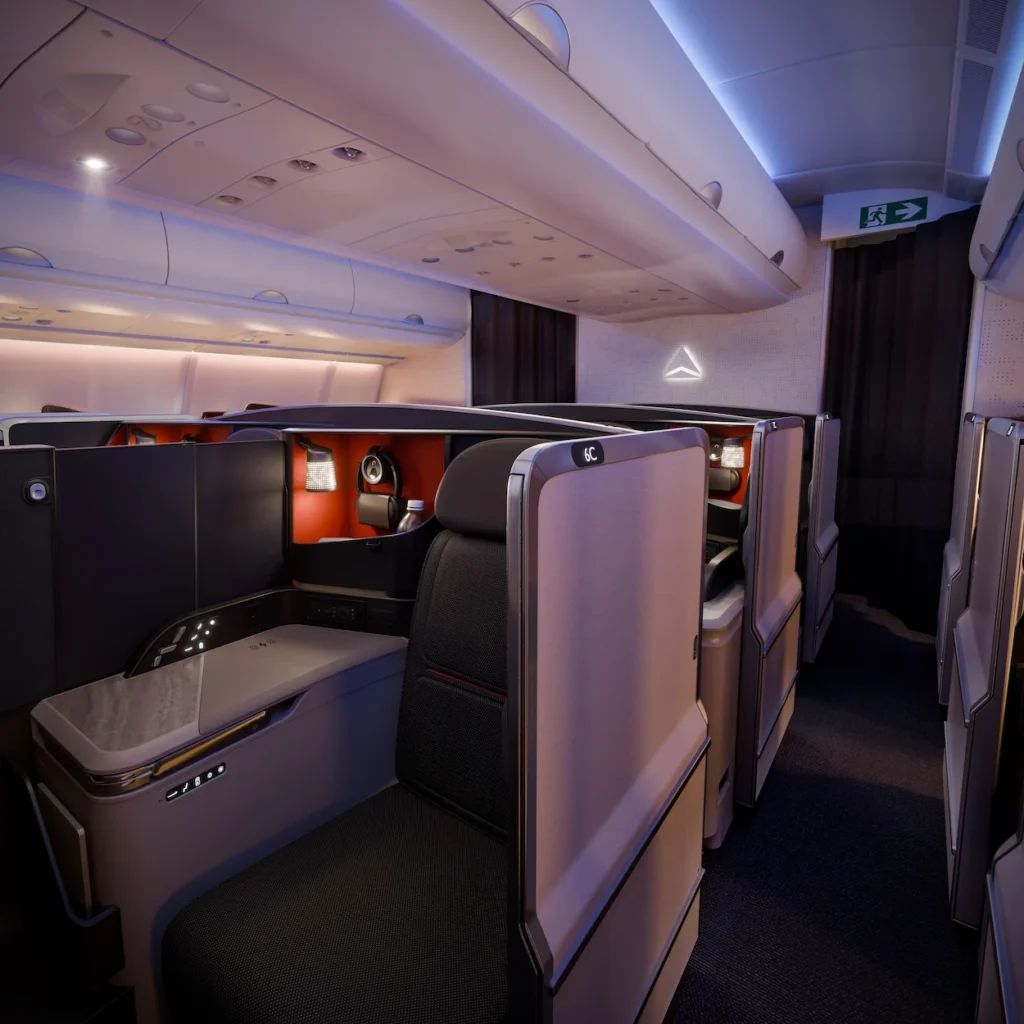 Delta Air Lines premium cabin featuring Delta One business class suites with privacy doors