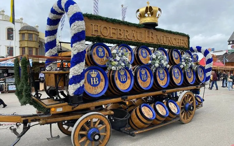 A decorated Hofbräu München beer wagon at a festival in Germany.