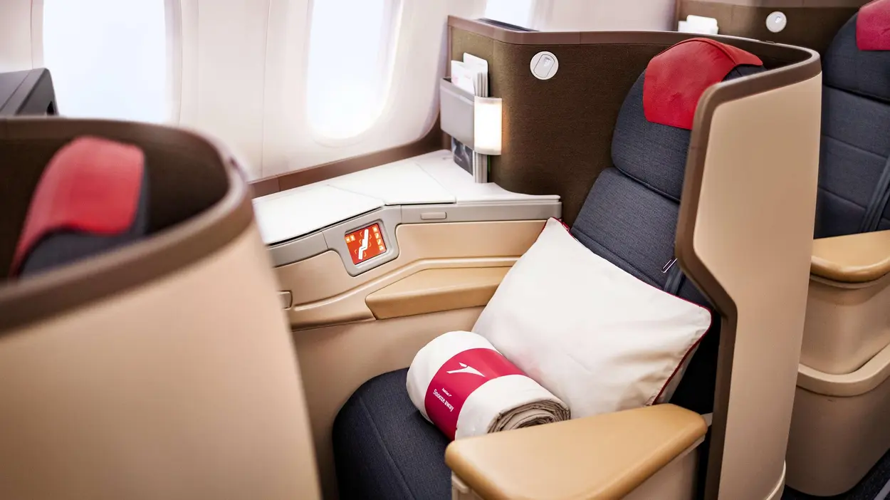 Austrian Airlines 787 Dreamliner business class seat with lie-flat bed and privacy panels