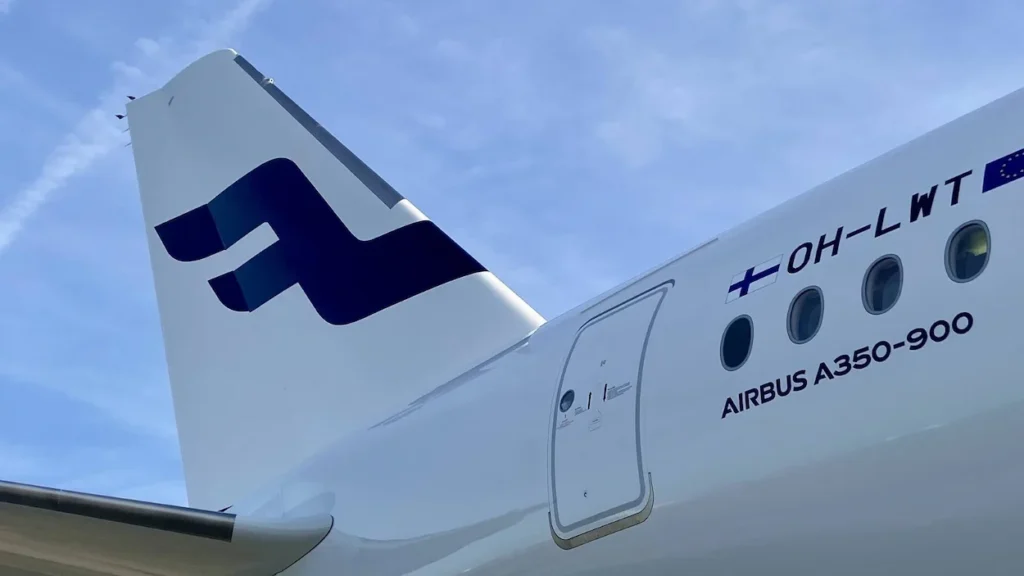 Finnair Airbus A350-900 aircraft featuring the airline’s signature Nordic blue tail logo