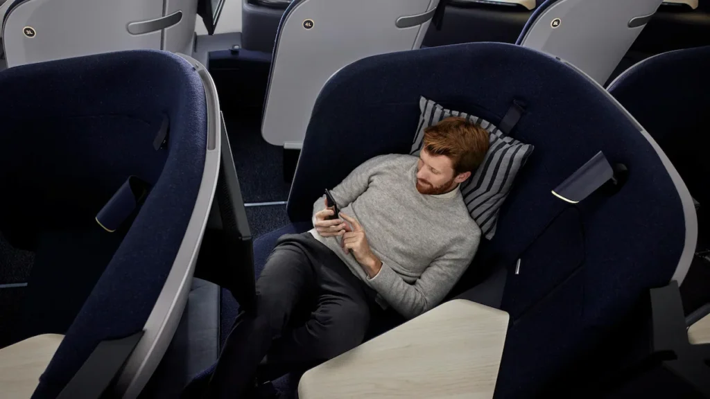 Finnair long-haul business class seat with a spacious, nest-like design for enhanced comfort