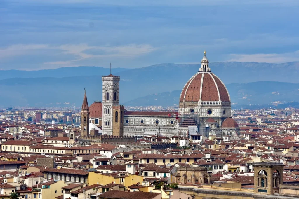 Florence Cathedral dome and Giotto's Campanile towering over rooftops