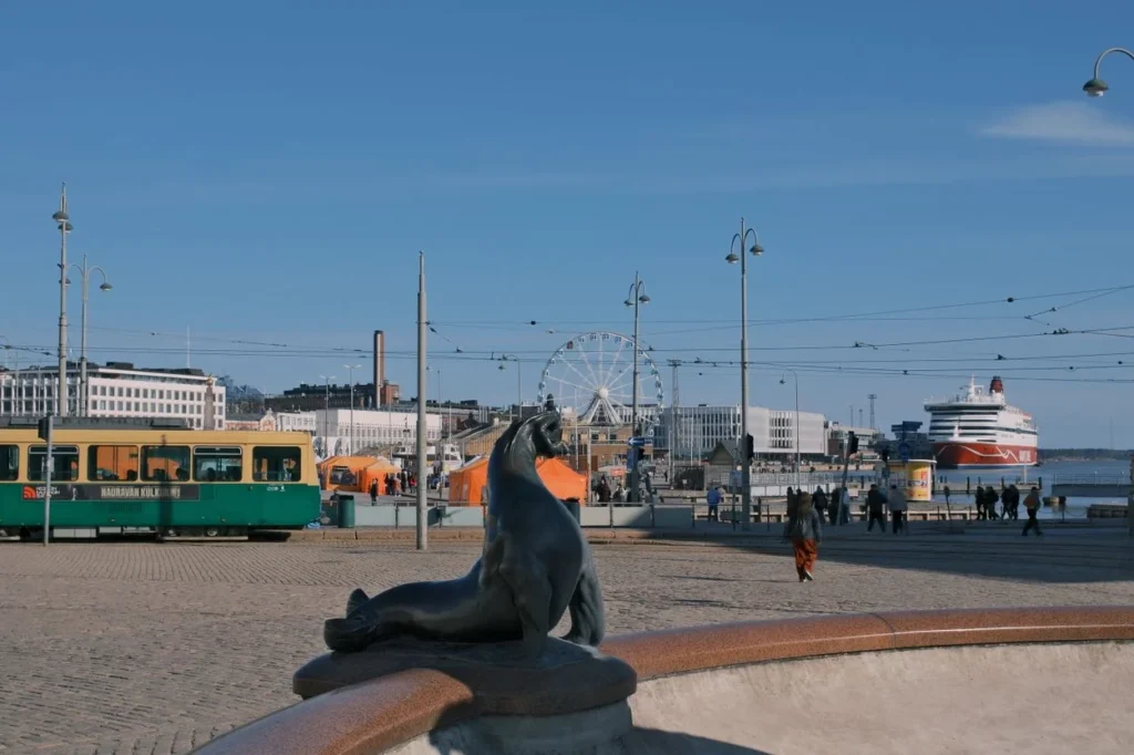 A bronze sea lion statue at the Havis Amanda fountain in Helsinki Market Square