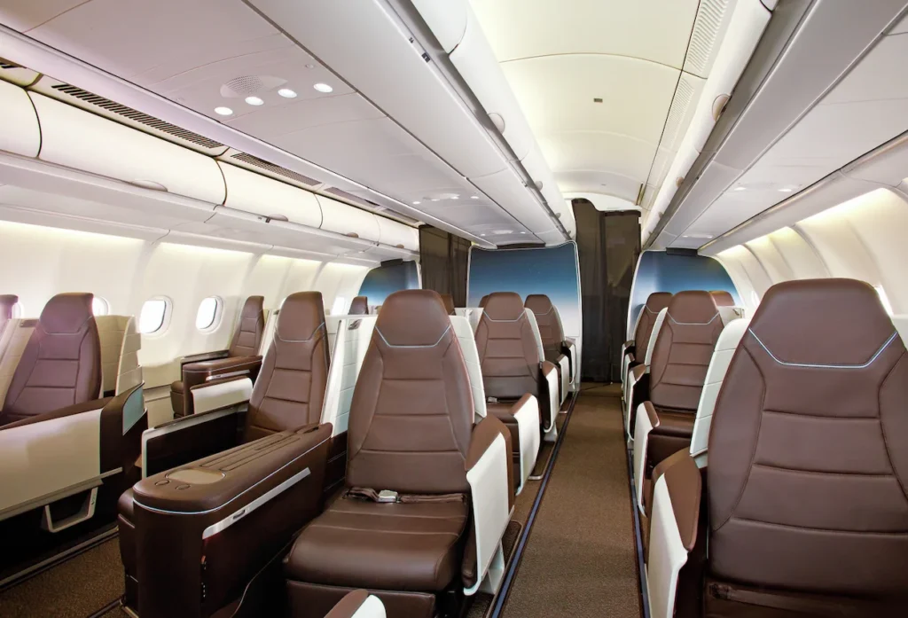 Hawaiian Airlines Airbus A330 First Class cabin showing brown leather lie-flat seats