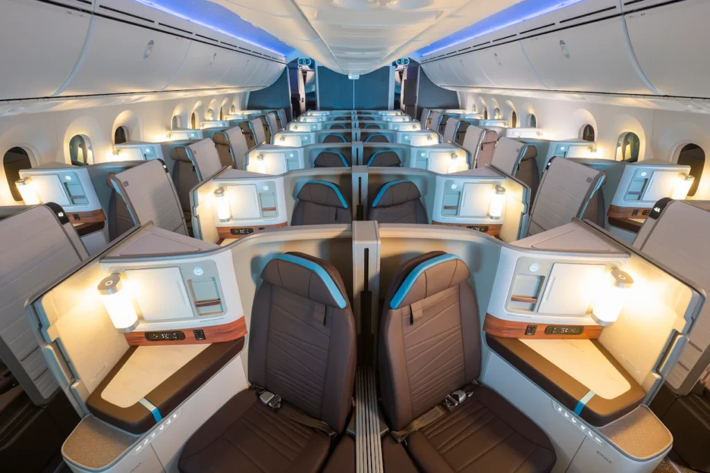 Hawaiian Airlines Boeing 787-9 premium cabin featuring brown leather suites