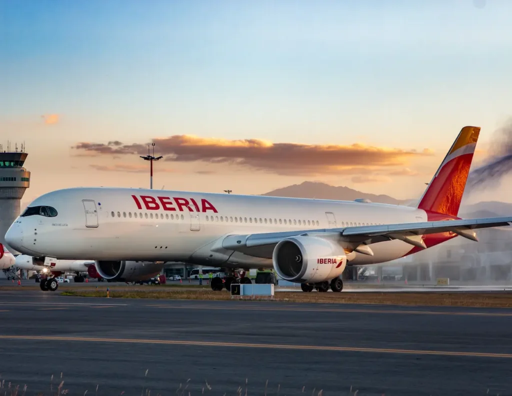 An Iberia Airbus A350 receives a traditional water cannon salute