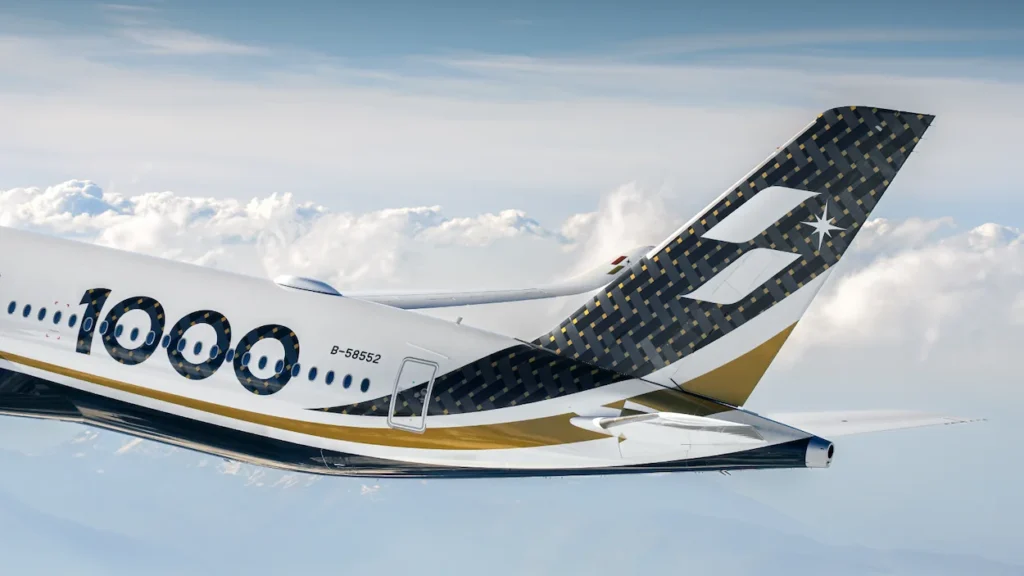 Woven-pattern tail fin and "1000" livery markings on a Starlux Airlines Airbus A350 jet