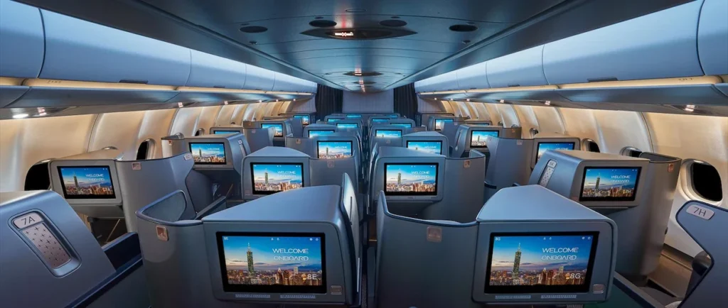 Starlux Airlines A330neo business class pods with blue welcome screens showing Taipei 101