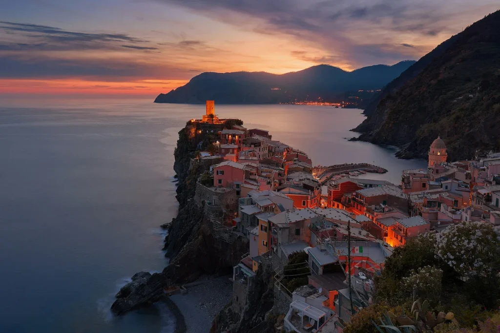 An evening view of Vernazza in Cinque Terre, Italy, at sunset
