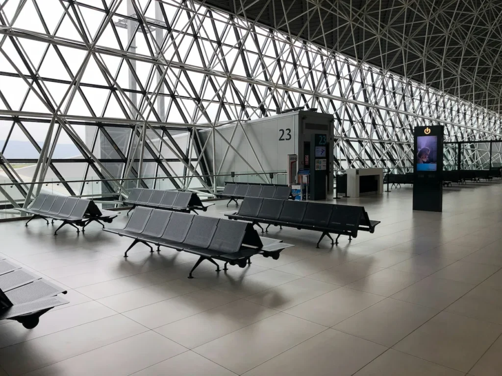 Empty departure gate seating area inside Zagreb Airport terminal
