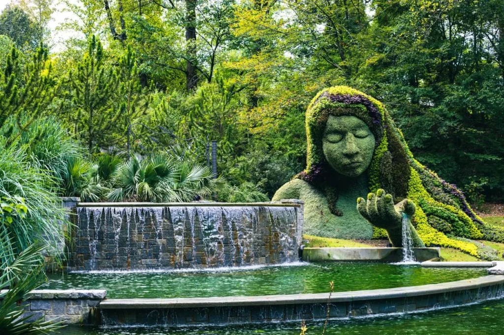 The Earth Goddess plant sculpture and waterfall at the Atlanta Botanical Garden