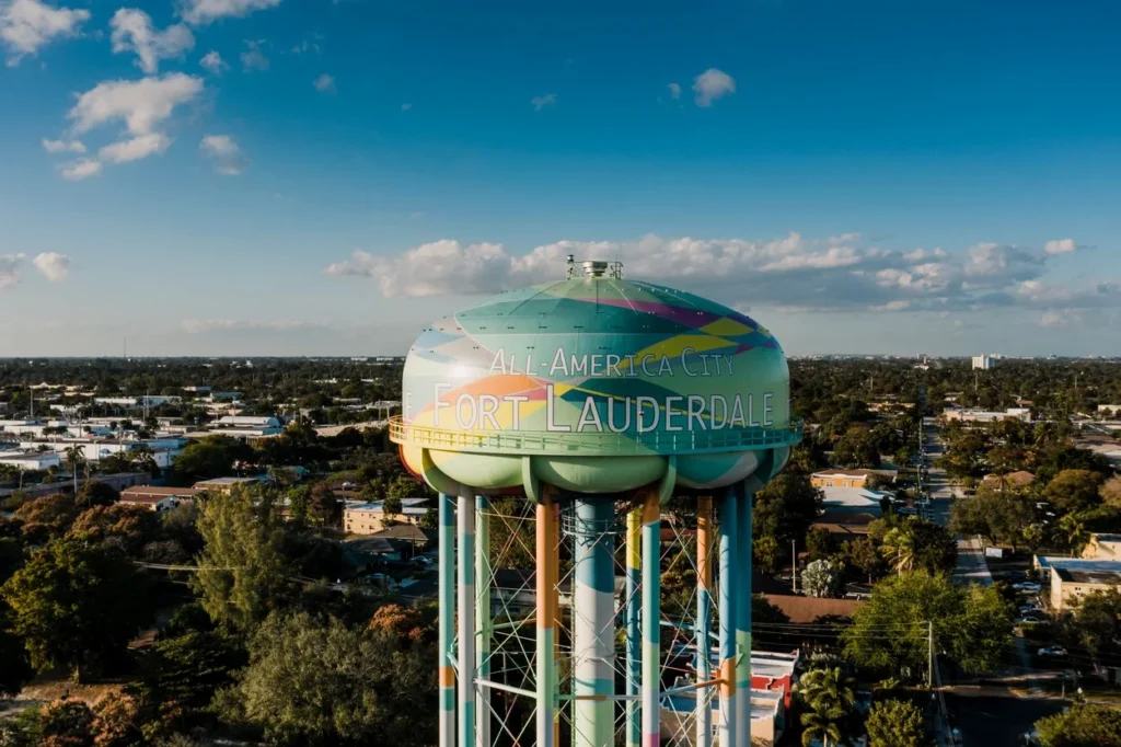 Colorful Fort Lauderdale water tower painted with All-America City text