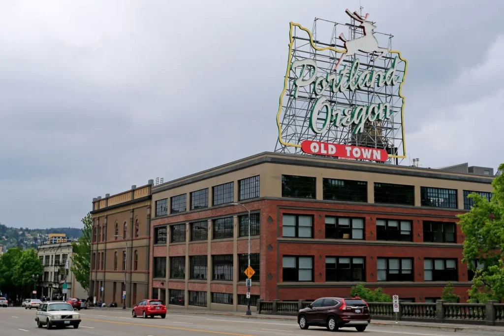 The historic White Stag sign reading Portland Oregon Old Town on a building