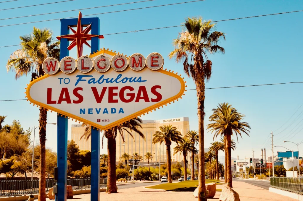 The iconic Welcome to Fabulous Las Vegas sign standing under a blue sky