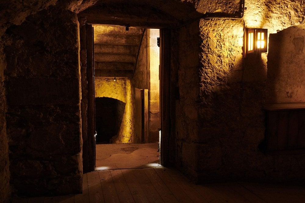 Dimly lit underground passage at The Real Mary King's Close.