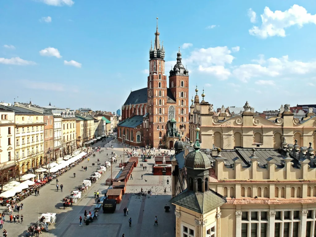 Elevated view of St. Mary's Basilica and the bustling Main Square in Krakow, Poland